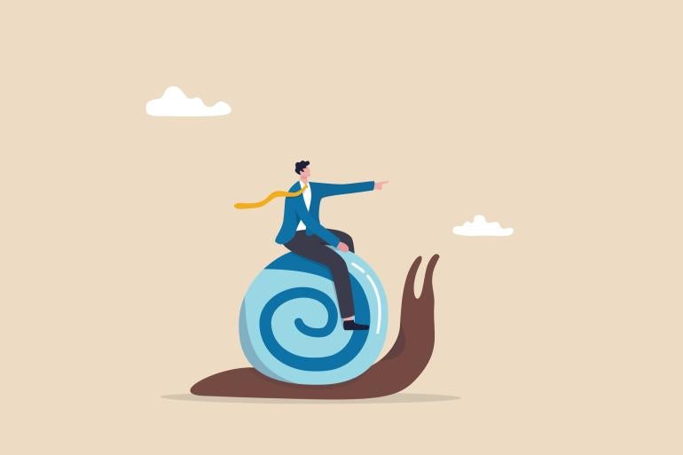 Man riding a snail forward to success. 