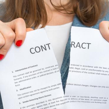 woman ripping up a contract