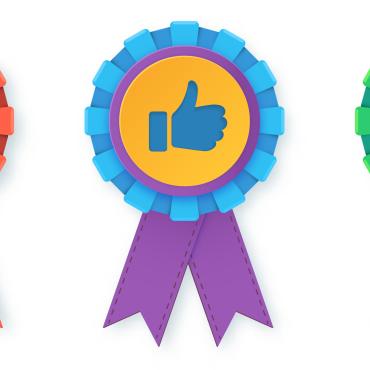 three award ribbons, one red with a heart, one blue and purple with a thumbs up, one green with a thumbs down