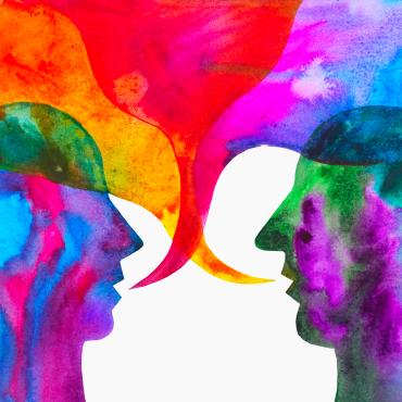Watercolor of two silhouettes speaking to each other. 