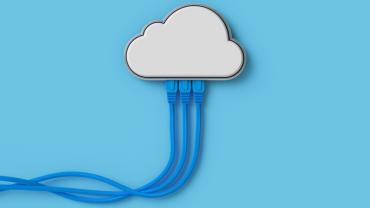 computer cables plugged into a cloud