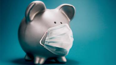 Piggy bank with medical mask