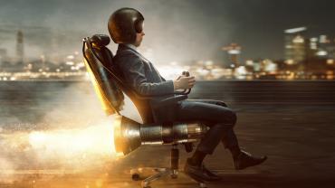 Businessman in a rocket chair