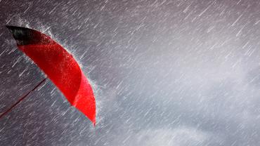 umbrella, red, up leaning toward sideways rain