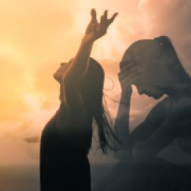 looks to be female, white, sitting down, head on hand, superimposed over herself with hands raised to sky