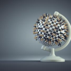 globe with chess pieces sticking menacing out from it