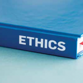 the word ethics on the spine of a book