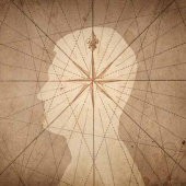 a compass rose and  human silouhette