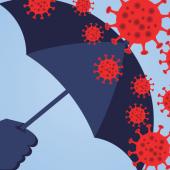 an umbrella blocking several virus cells