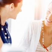 two women collaborating together