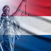 Lady Justice with Netherlands flag background