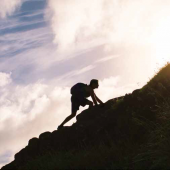 a person climbing a mountain